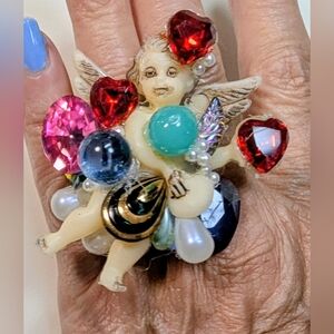 Wendy Gell ring cherub with hearts Swarovski stones and wings.